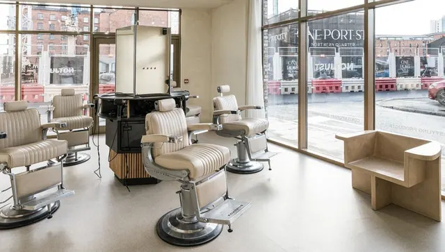 Cream leather barber chairs by the front window