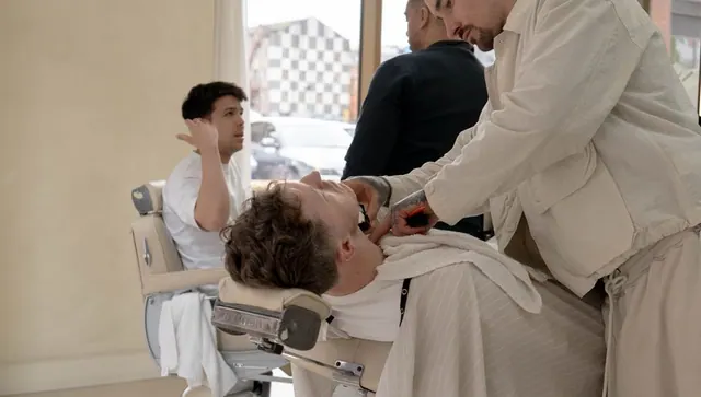 A hot-towel shave in progress